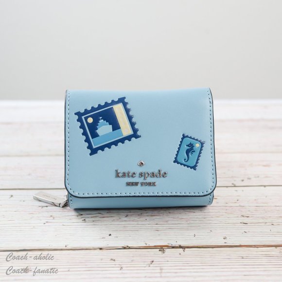 kate spade Handbags - NWT Kate Spade Off The Grid Small Trifold Wallet
